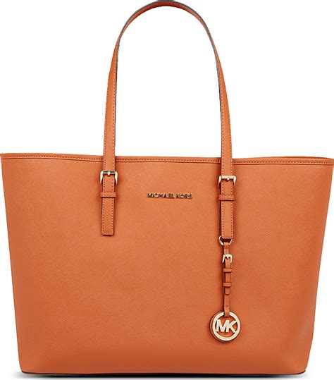 michael kors burnt orange large jet set tote|Michael Kors jet set airplane.